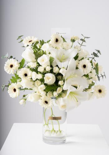 Floral Arrangement in Clear Vase